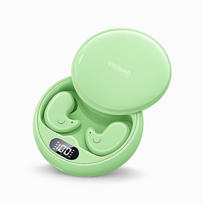 Product photograph of mint green VISOUND wireless earbuds with playful smiling faces nestled inside a partially open charging case displaying a 100 battery charge on a white background